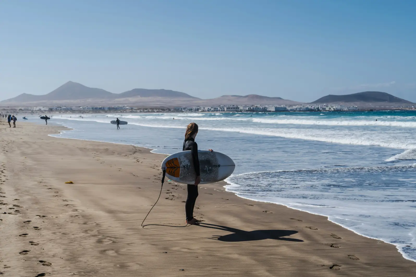 Surfer on the beach in Lanzarote